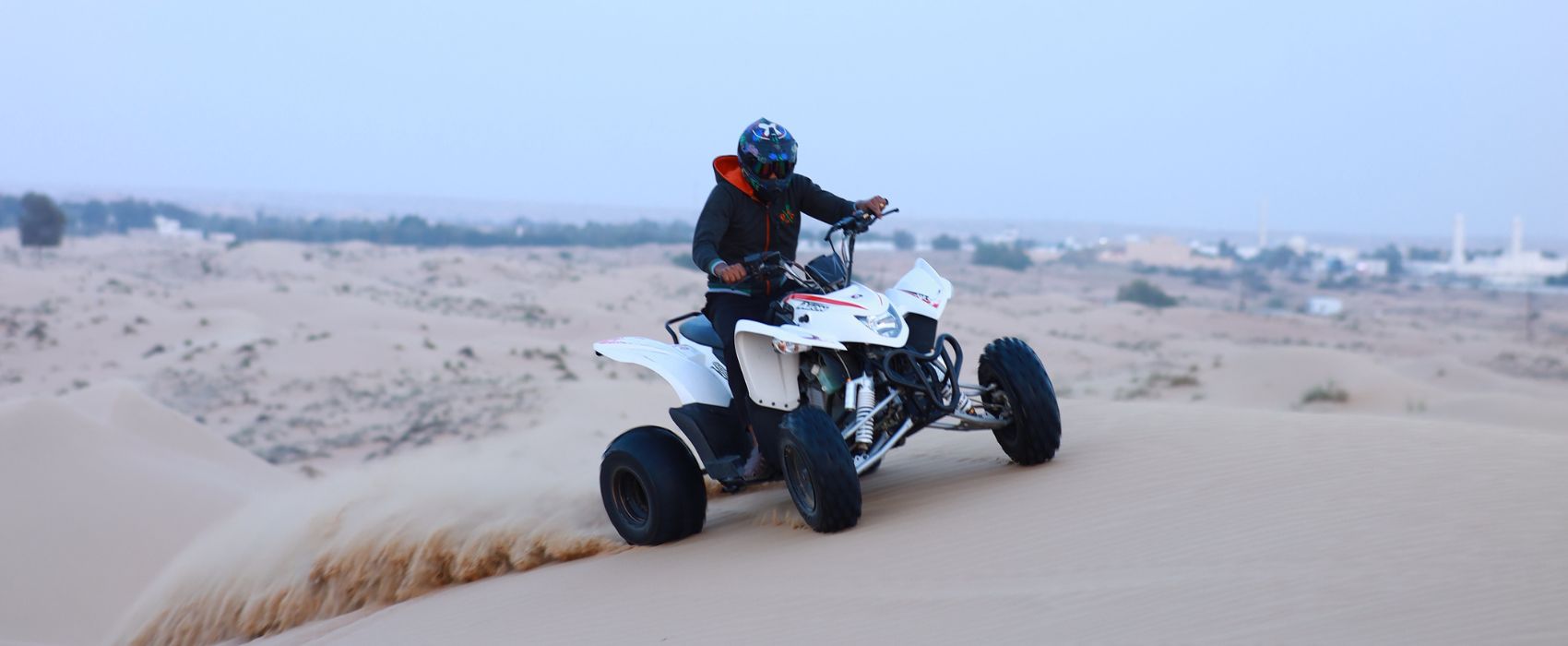 man-riding-quad-bike